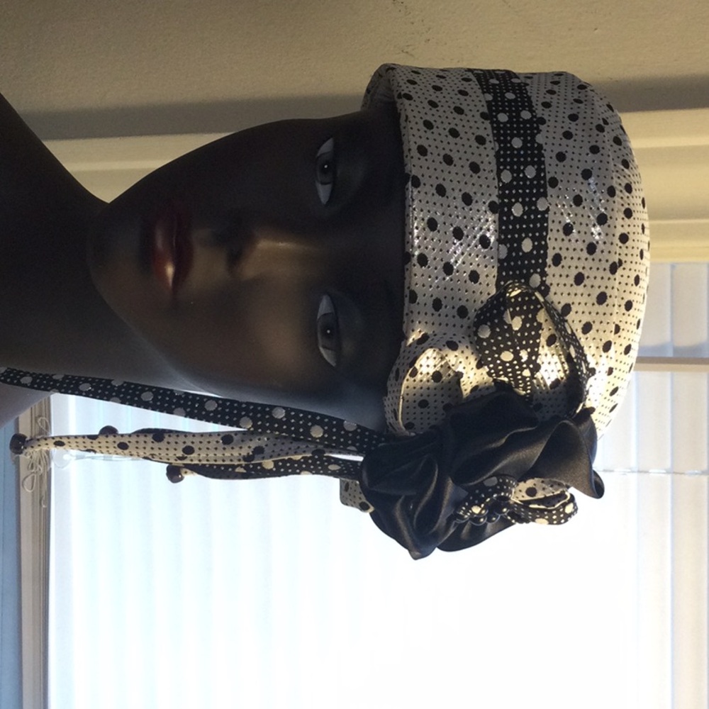 Black and White polka dot decorated hat.